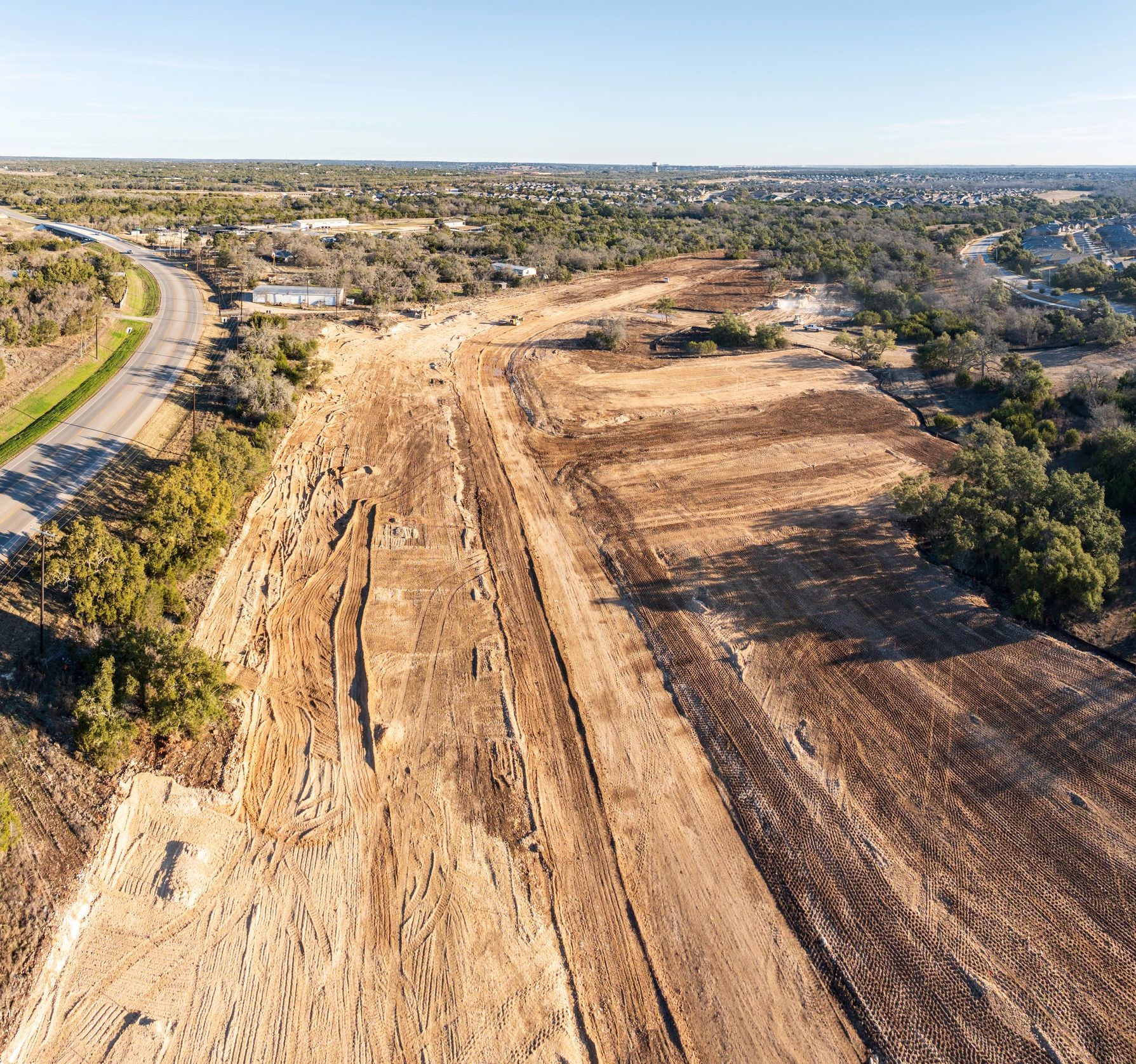 construction site Texas grading excavation civil engineering heavy equipment